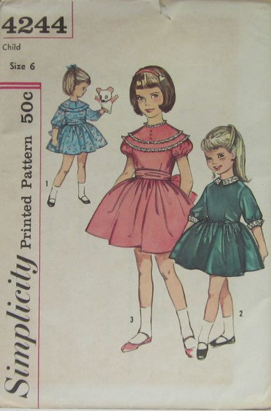CHILD'S ONE-PIECE DRESS WITH DETACHABLE COLLAR AND CUFFS