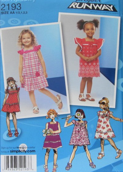 TODDLERS AND CHILDS DRESS WITH TRIM VARIATINS