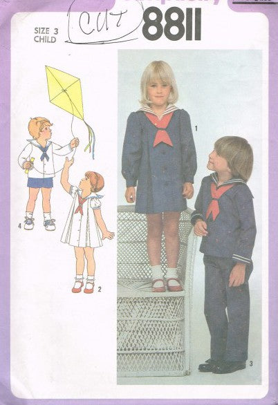 CHILD'S DRESS, TOP AND PANTS OR SHORTS CUT